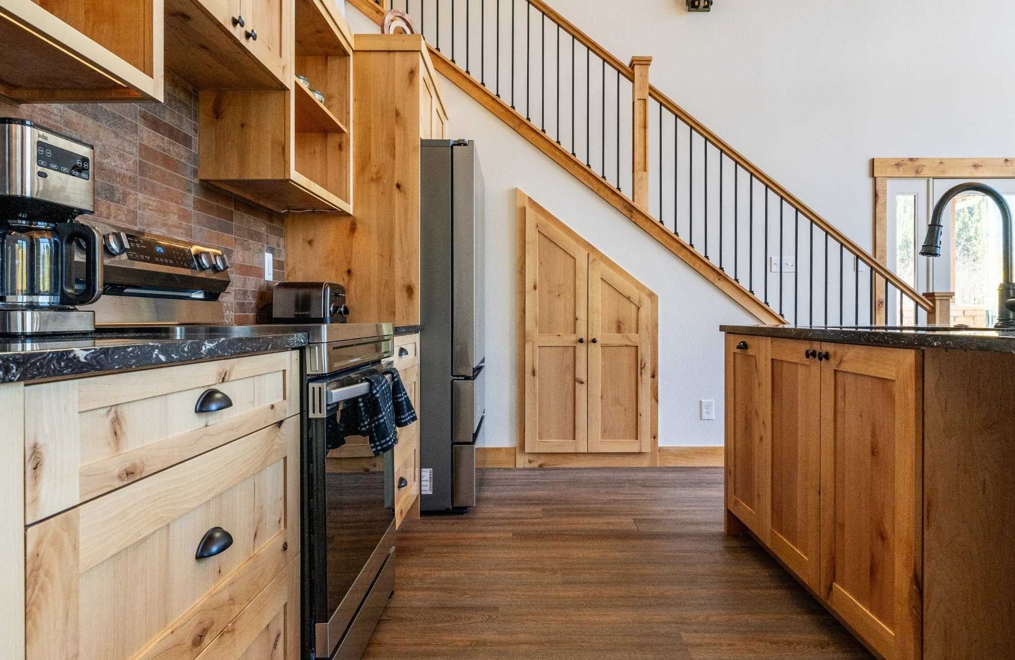 A kitchen remodel featuring natural wood cabinetry in Superior, CO by Petra Custom Builders A kitchen remodel featuring natural wood cabinetry in Superior, CO by Petra Custom Builders