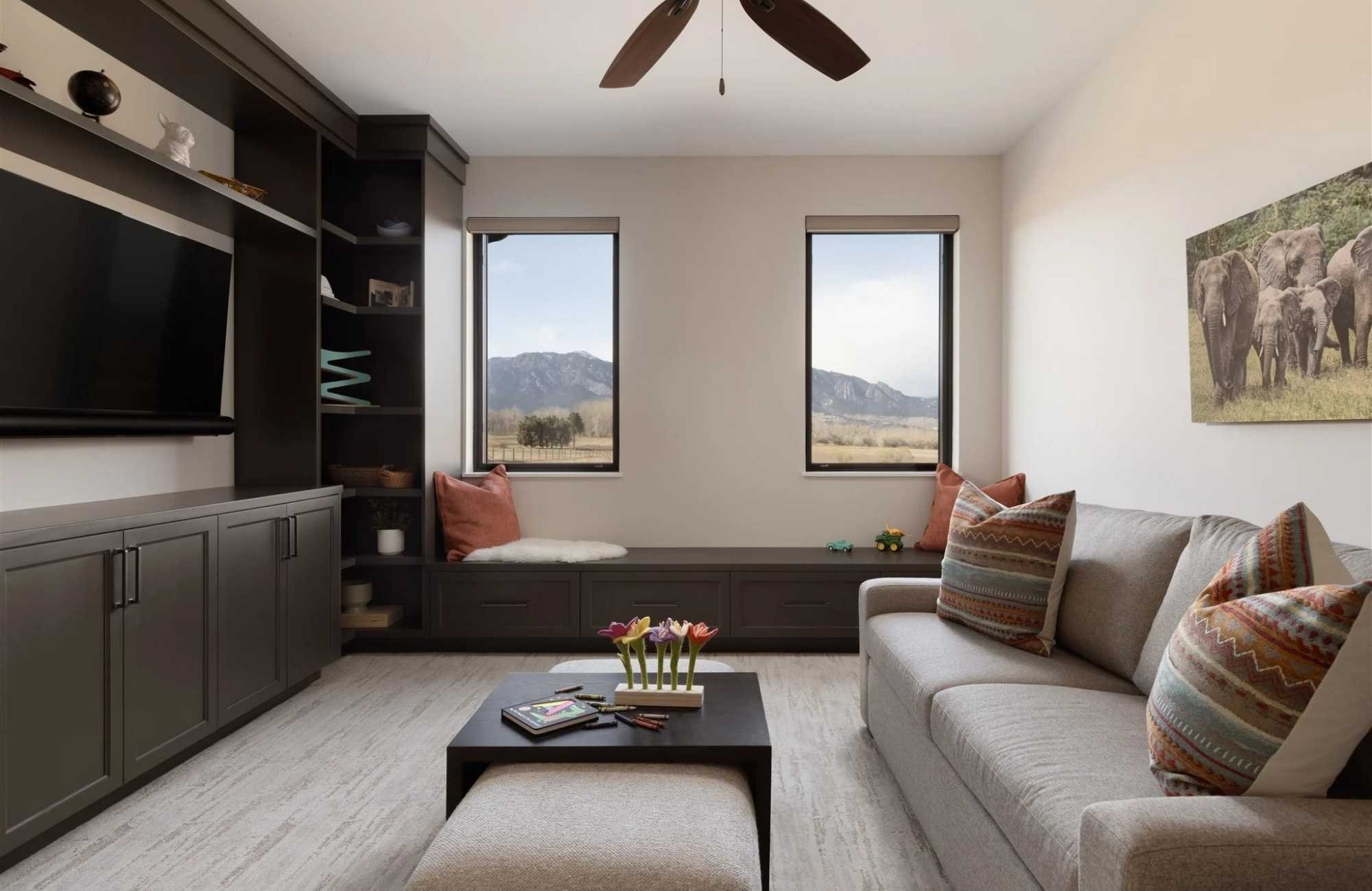 A living room in a whole home remodel with custom storage and a window seat by Petra Custom Builders in Louisville, CO A living room in a whole home remodel with custom storage and a window seat by Petra Custom Builders in Louisville, CO
