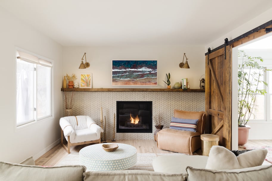 cozy small living room remodel with barn door and fireplace