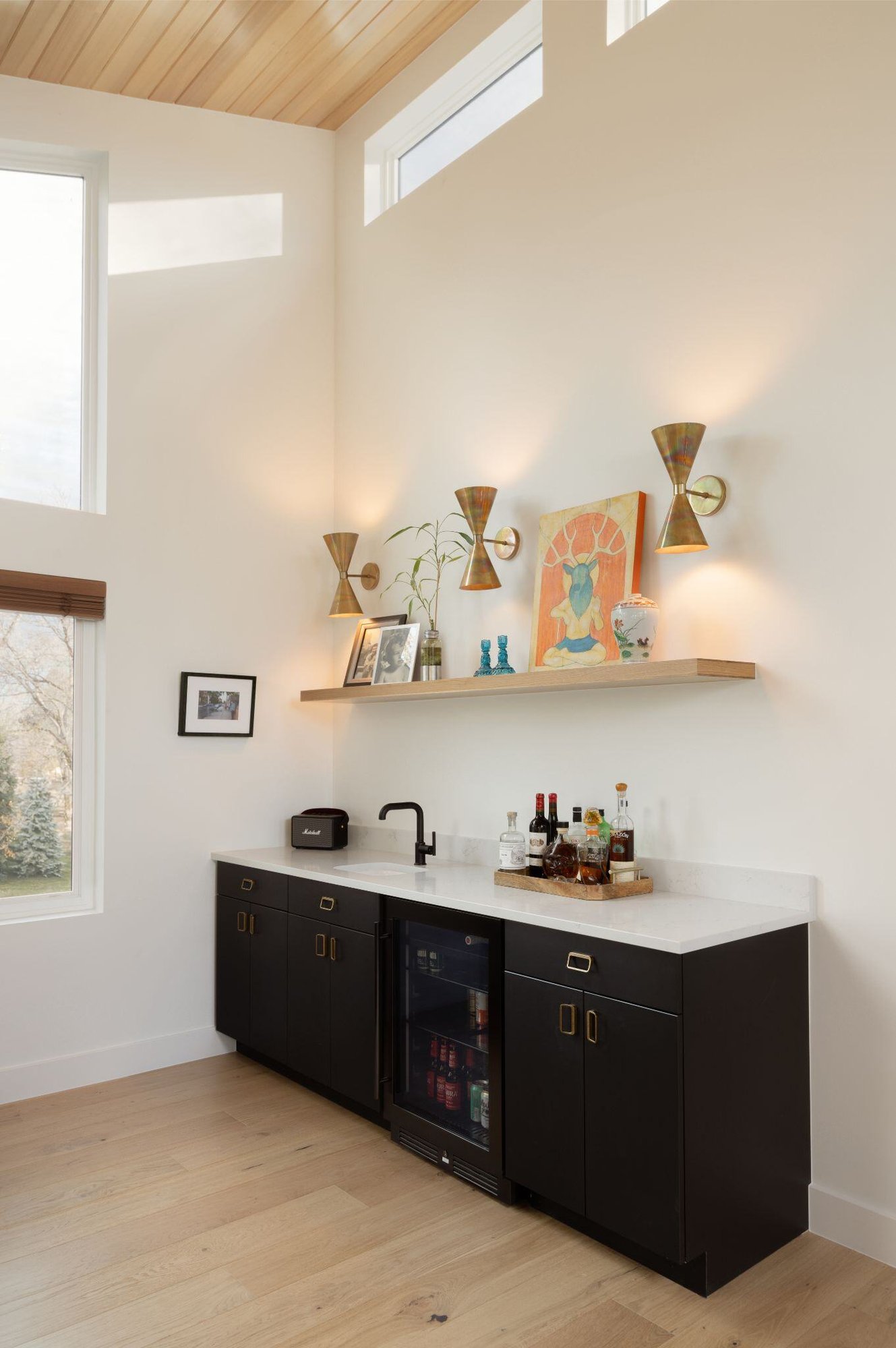 coffee bar in home remodel in boulder colorado with open shelf and mini fridge