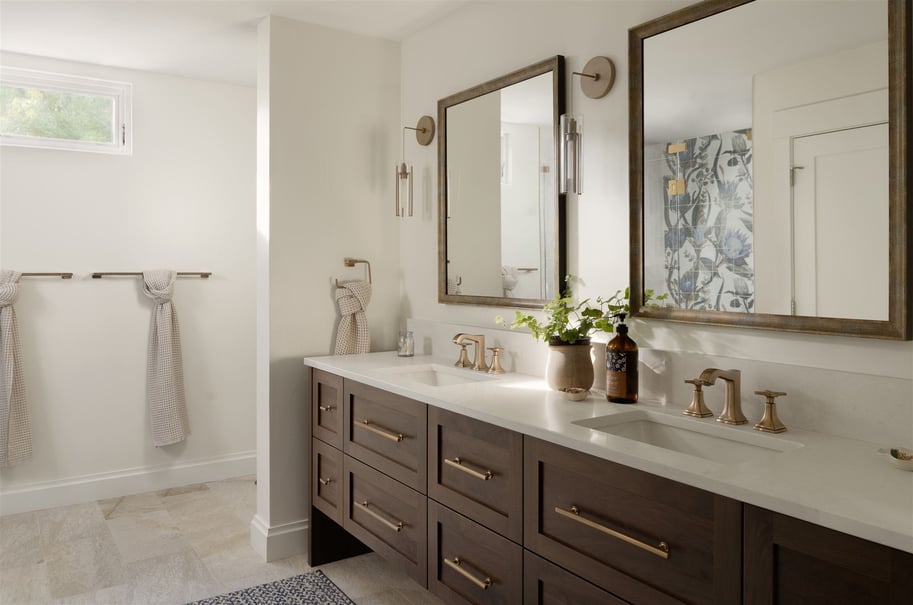 Boulder bathroom remodel with brown double sink vanity and double mirror