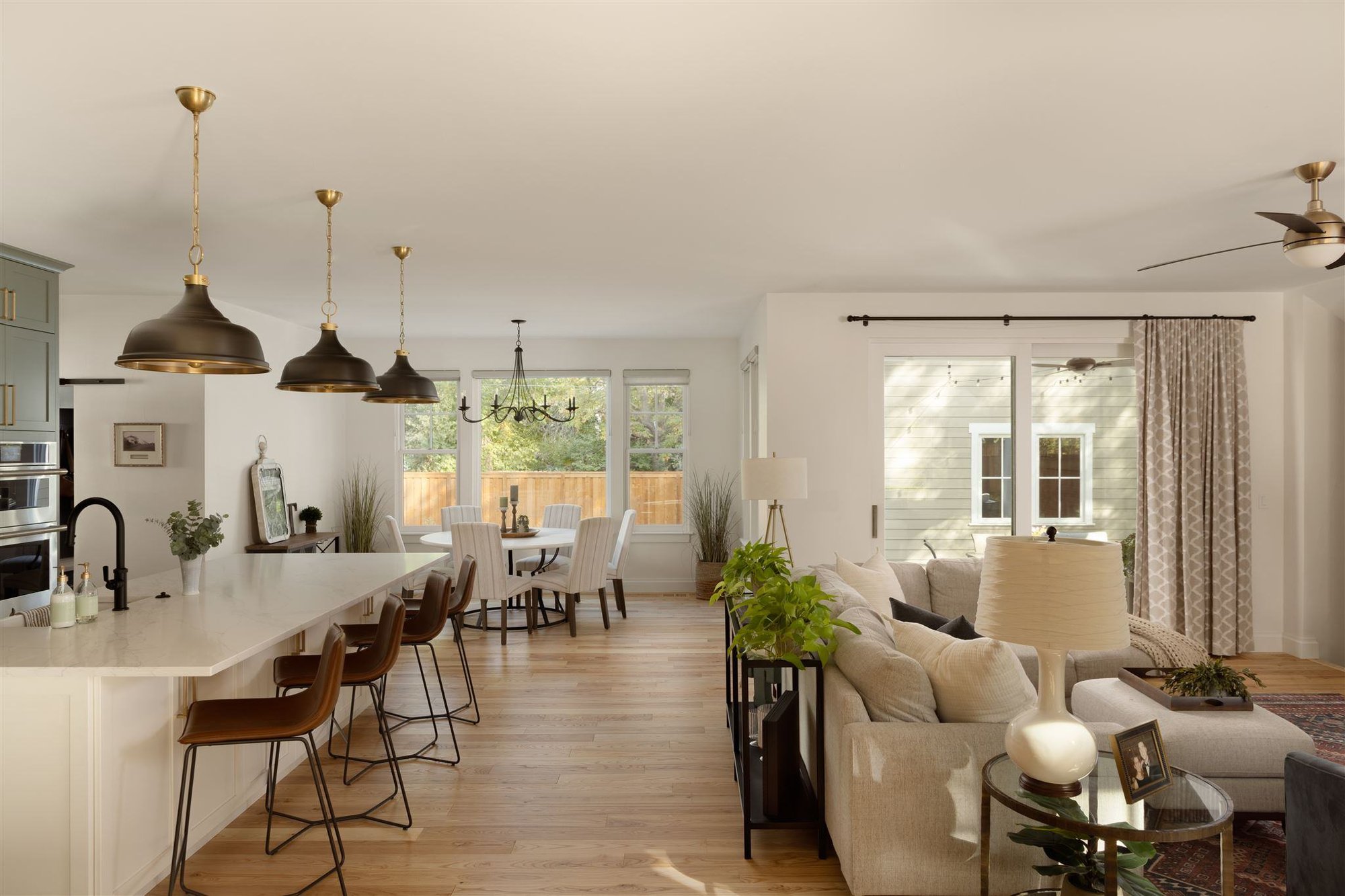 Open layout kitchen, dining, and living area in a modern Colorado home
