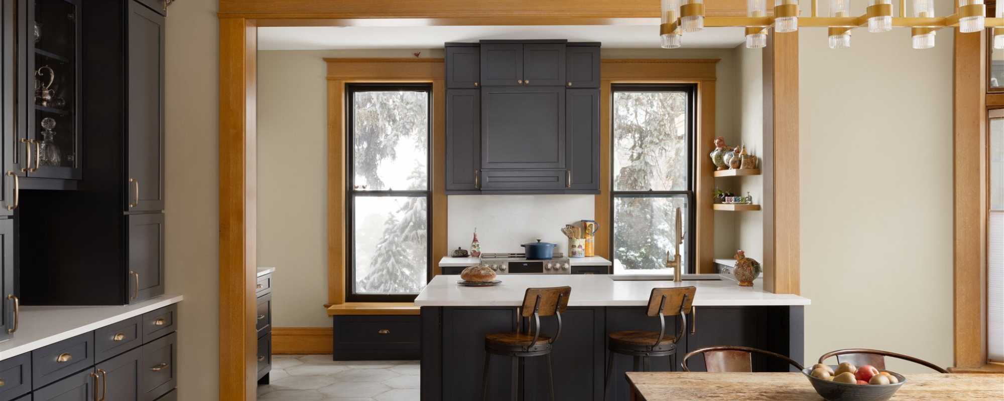 Image of custom kitchen remodel with navy cabinetry and large island in Old Town Longmont, CO