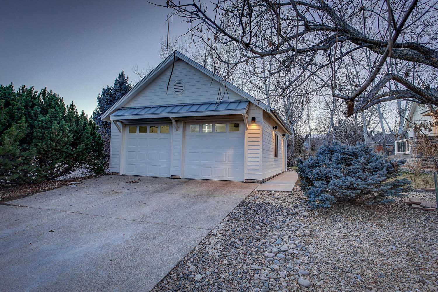 Snowy White Garage on a Grey Winter Day