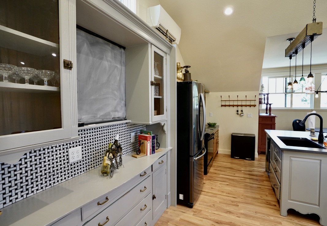ADU kitchen view with antique finishes